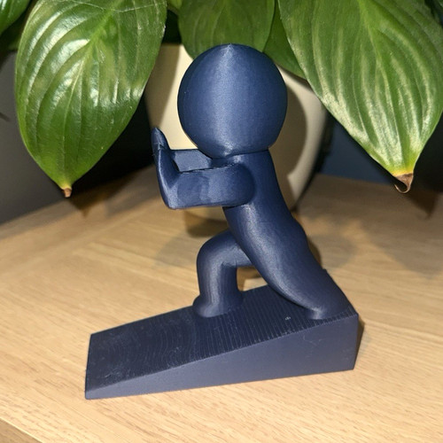 Sleek doorstop man door